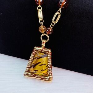 Beautiful, bohemian chic, dressy, animal, print pendant costume necklace